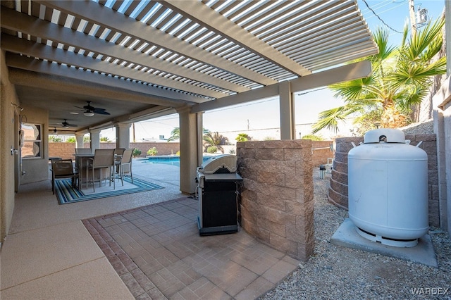 view of patio featuring ceiling fan, a fenced in pool, fence, and a pergola