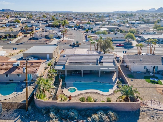 bird's eye view featuring a residential view and a mountain view