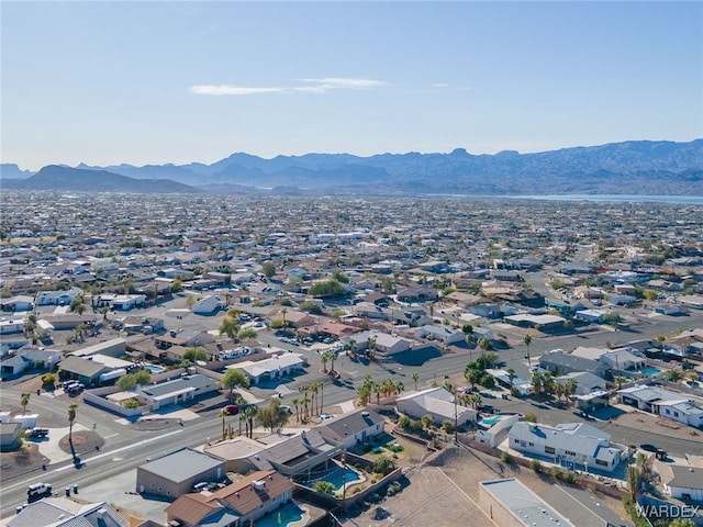 bird's eye view with a residential view and a mountain view