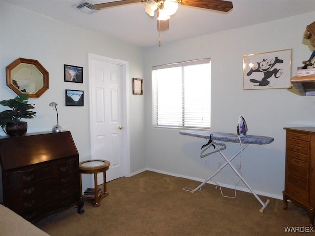 miscellaneous room with baseboards, ceiling fan, visible vents, and carpet flooring