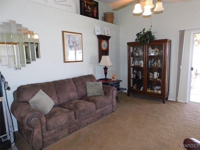 living area featuring plenty of natural light and carpet