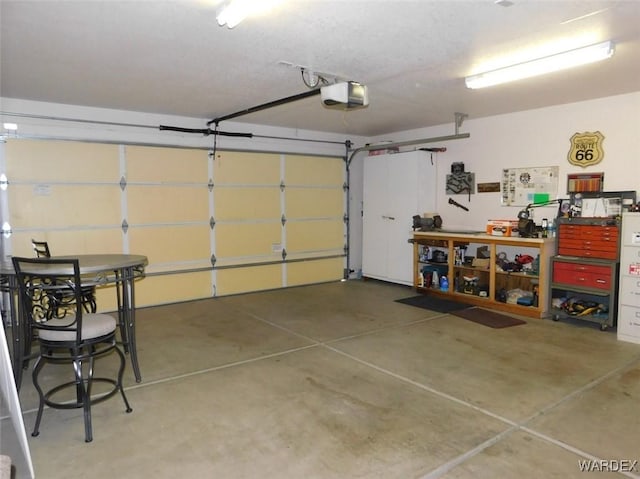 garage featuring a garage door opener