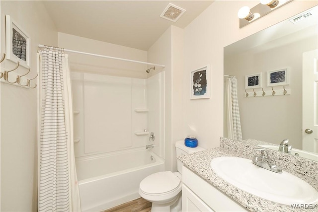 bathroom with toilet, shower / bathtub combination with curtain, visible vents, and vanity