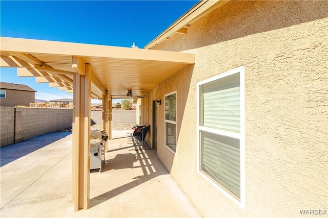 view of patio with fence