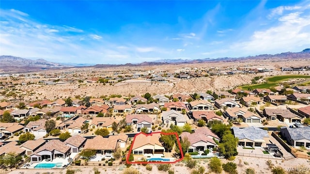 bird's eye view featuring a mountain view and a residential view