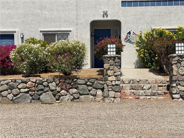 211 Columbine Dr, Lake Havasu, AZ 86403 - property entrance featuring stucco siding