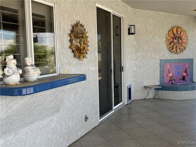 211 Columbine Dr, Lake Havasu, AZ 86403 - doorway to property featuring stucco siding