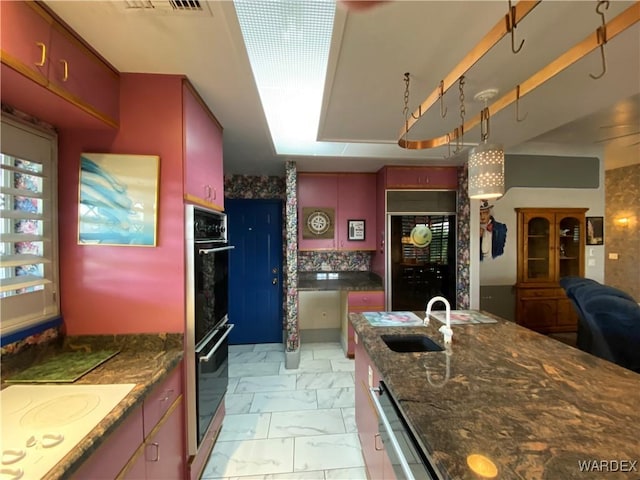 211 Columbine Dr, Lake Havasu, AZ 86403 - kitchen with a sink, dishwasher, dobule oven black, white electric cooktop, and marble finish floor