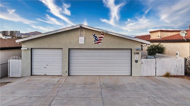 detached garage with fence