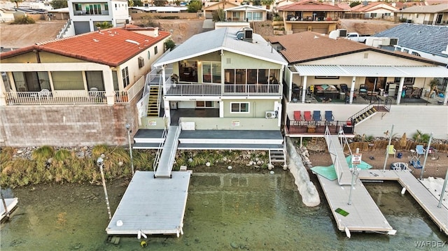 back of house featuring a residential view