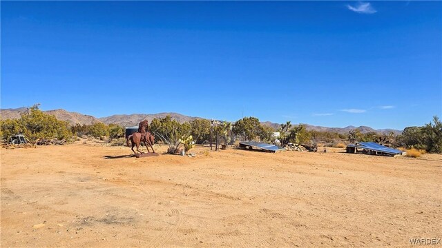 exterior space featuring a rural view and a mountain view