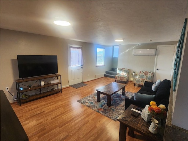 1900 W Guardian Dr, Meadview, AZ 86444 - living area with a wall unit AC and wood finished floors