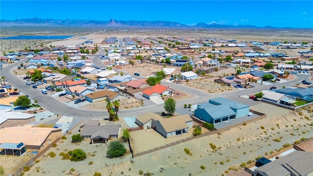 6053 S Klamath Loop, Fort Mohave, AZ 86426 - aerial perspective of suburban area featuring a mountain backdrop