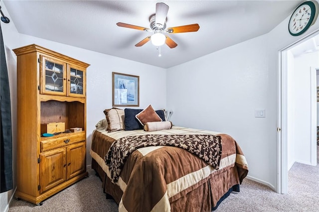 6053 S Klamath Loop, Fort Mohave, AZ 86426 - bedroom featuring carpet flooring and a ceiling fan