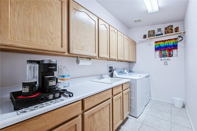 6053 S Klamath Loop, Fort Mohave, AZ 86426 - laundry room with independent washer and dryer, cabinet space, and light tile patterned floors