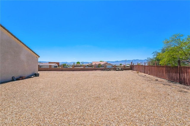 6053 S Klamath Loop, Fort Mohave, AZ 86426 - view of yard featuring a mountain view