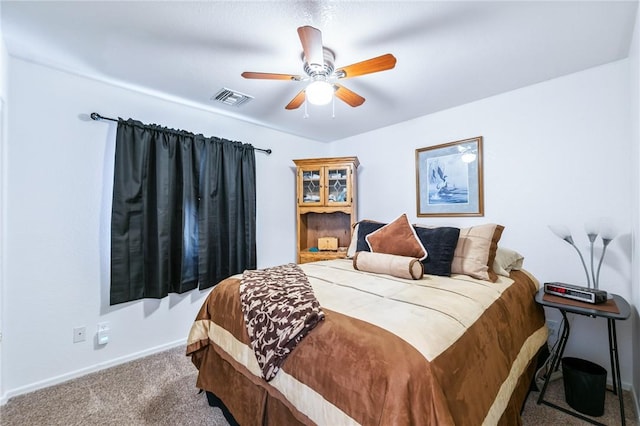 6053 S Klamath Loop, Fort Mohave, AZ 86426 - carpeted bedroom with baseboards and ceiling fan