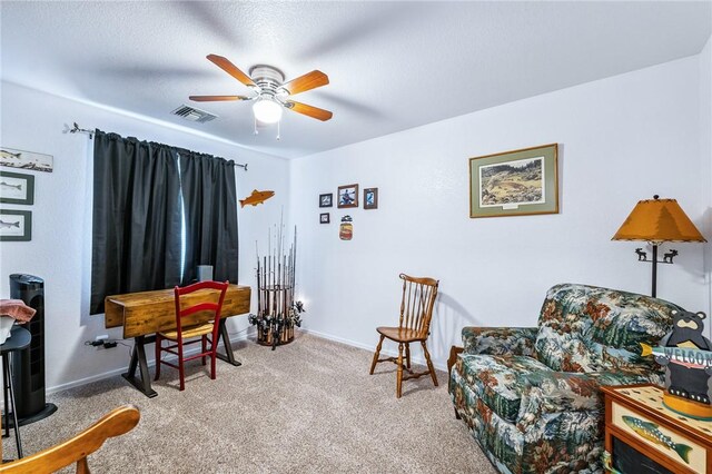 6053 S Klamath Loop, Fort Mohave, AZ 86426 - living area featuring carpet and a ceiling fan