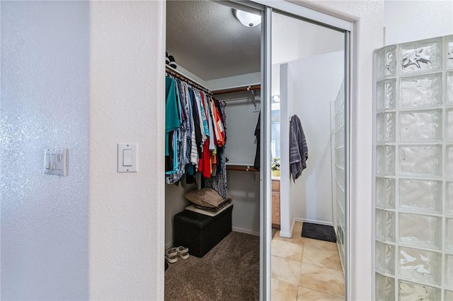 6053 S Klamath Loop, Fort Mohave, AZ 86426 - spacious closet featuring light tile patterned floors