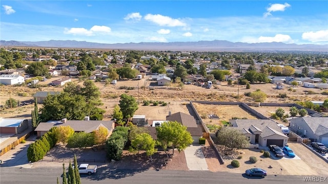 bird's eye view with a residential view and a mountain view