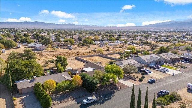 drone / aerial view with a residential view and a mountain view