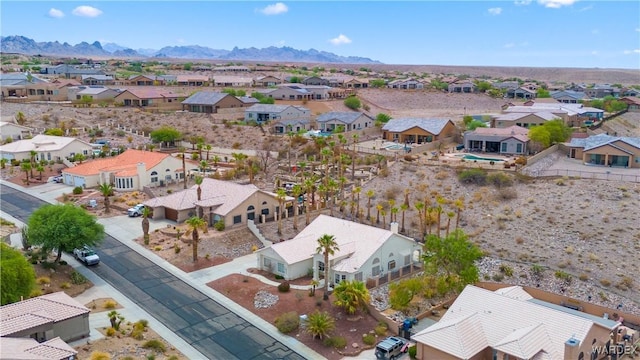 birds eye view of property with a residential view and a mountain view