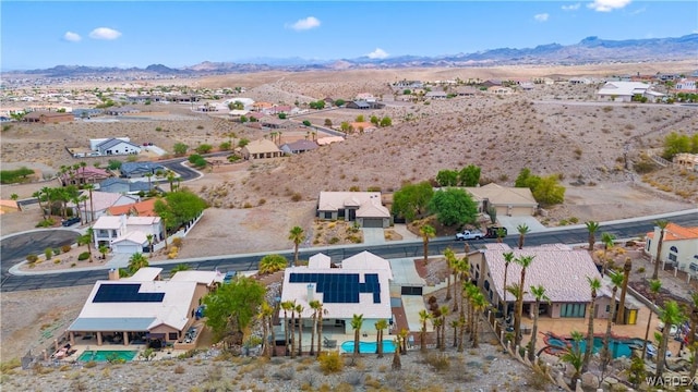 drone / aerial view with a residential view and a mountain view