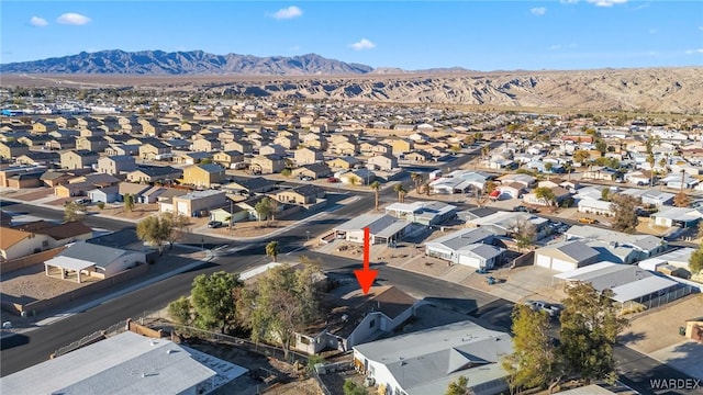 bird's eye view with a residential view and a mountain view