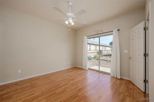 unfurnished room featuring light wood finished floors, ceiling fan, and baseboards