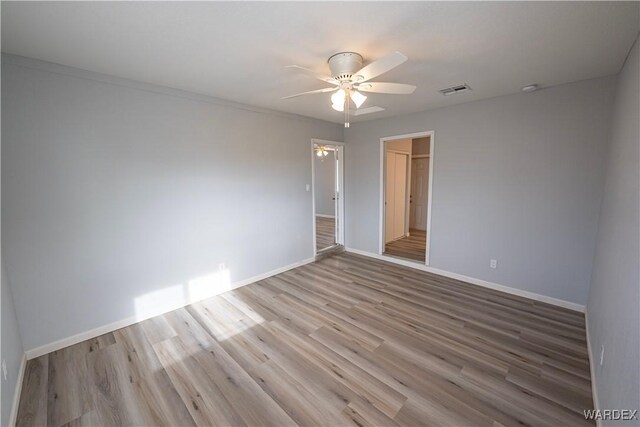 2615 E Devlin Ave, Kingman, AZ 86409 - spare room with ceiling fan and wood finished floors