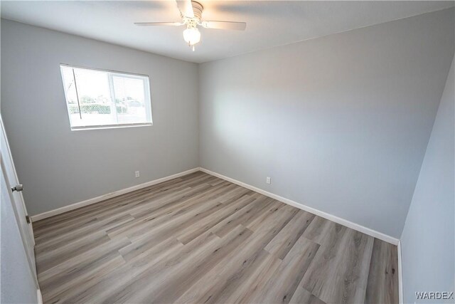 2615 E Devlin Ave, Kingman, AZ 86409 - empty room with light wood-style flooring and a ceiling fan