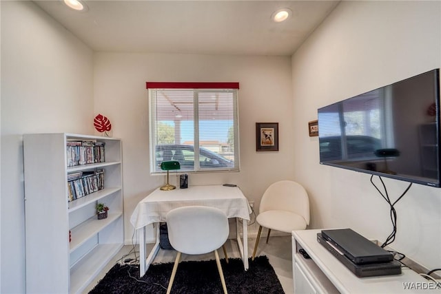 office with baseboards and recessed lighting