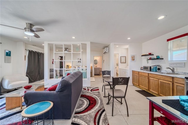 living area featuring a ceiling fan, french doors, an AC wall unit, and recessed lighting