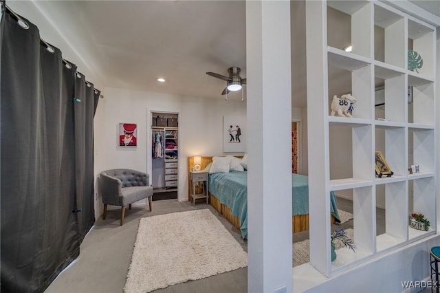 bedroom featuring recessed lighting and a closet