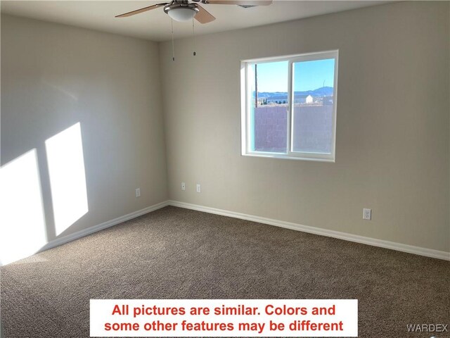 carpeted empty room with ceiling fan and baseboards