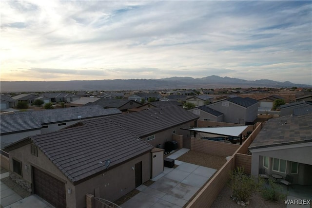 birds eye view of property featuring a residential view and a mountain view