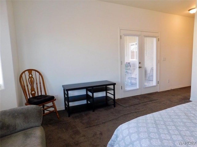 bedroom featuring dark colored carpet and french doors