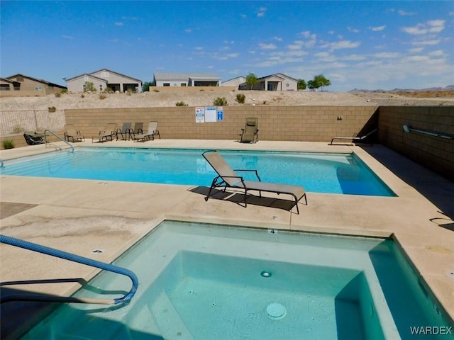 view of pool featuring fence and a fenced in pool