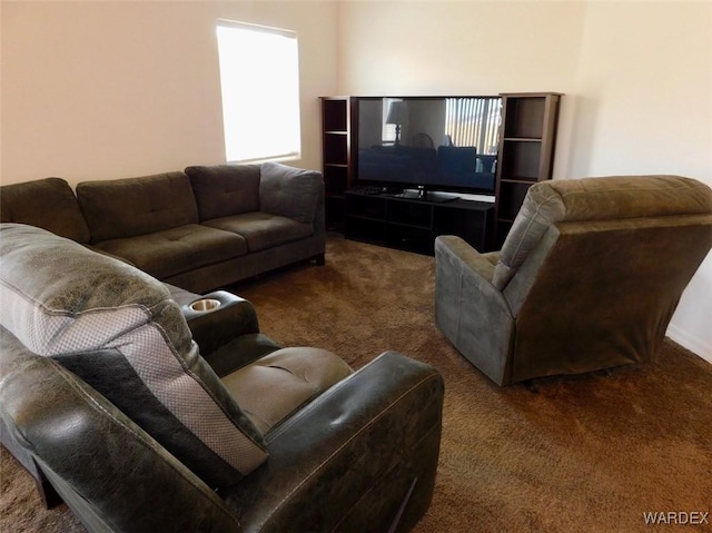 living area with dark carpet