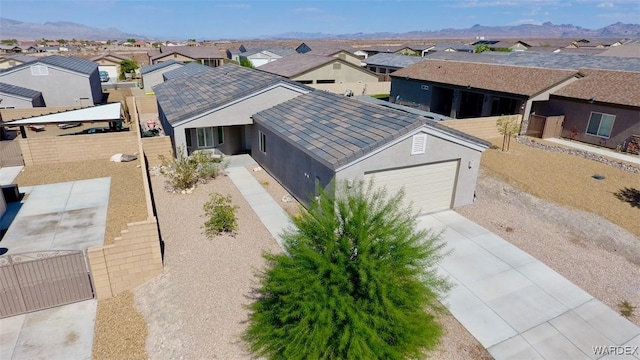 bird's eye view featuring a residential view and a mountain view