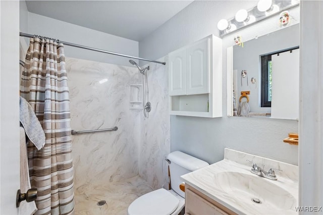 bathroom featuring curtained shower, vanity, and toilet