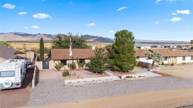 view of front of property featuring a residential view and a mountain view