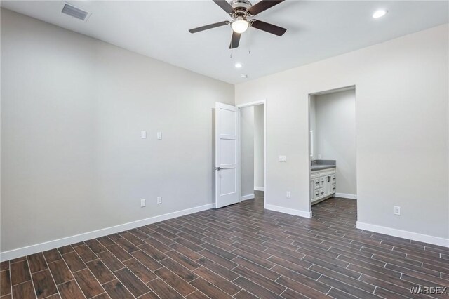 unfurnished bedroom with dark wood finished floors, recessed lighting, visible vents, a ceiling fan, and baseboards