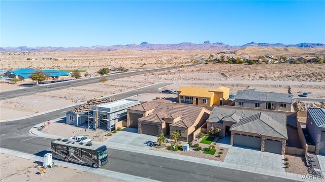 aerial view with a residential view and a mountain view