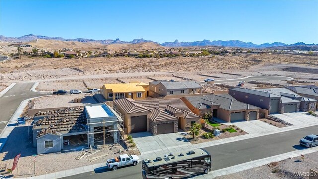 birds eye view of property featuring a residential view and a mountain view