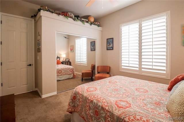 10730 S River Terrace Dr, Mohave Valley, AZ 86440 - carpeted bedroom with baseboards and a ceiling fan