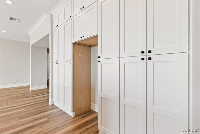 closet featuring visible vents