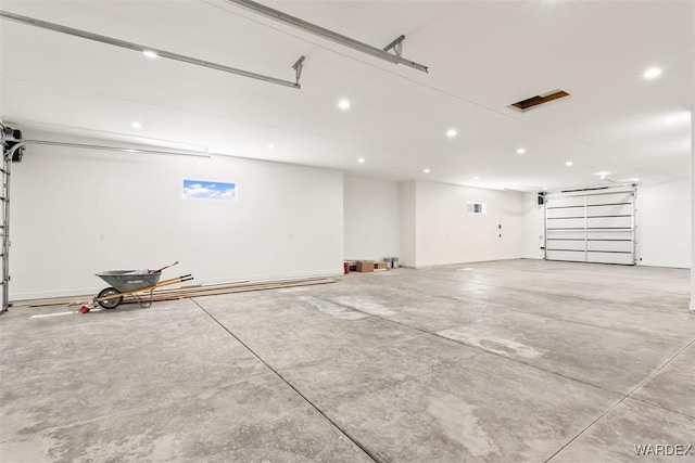 parking deck featuring recessed lighting