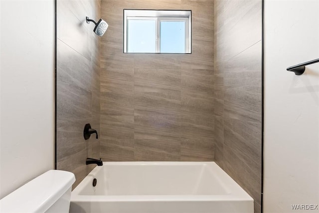 full bathroom with bathtub / shower combination and toilet