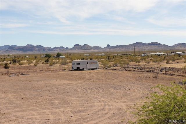 property view of mountains featuring a rural view